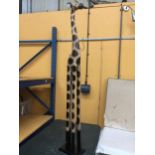 A LARGE WOODEN GIRAFFE HEIGHT 150CM