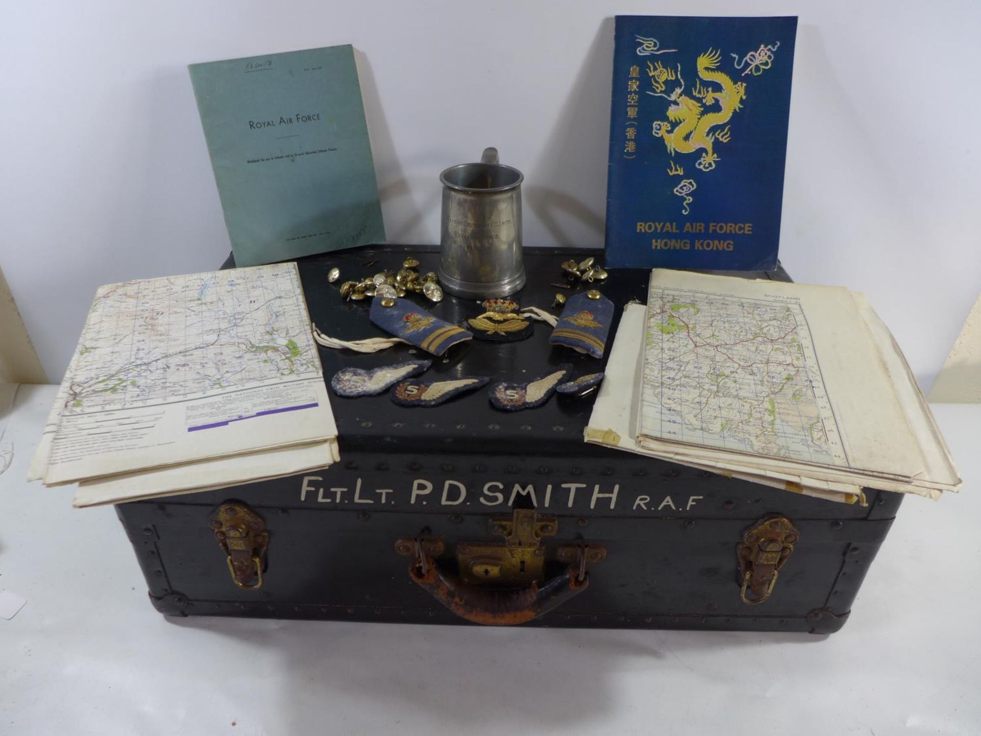 A COLLECTION OF EPHEMERA RELATING TO FLIGHT LIEUTENANT P.D. SMITH OF THE R.A.F. COMPRISING TRUNK,