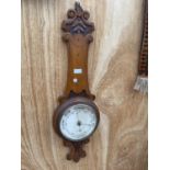 A VINTAGE WOODEN CASED WALL HANGING BAROMETER