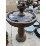 A PLASTIC INDOOR OR OUTDOOR WATER FOUNTAIN WITH SMALL BIRD DECORATION