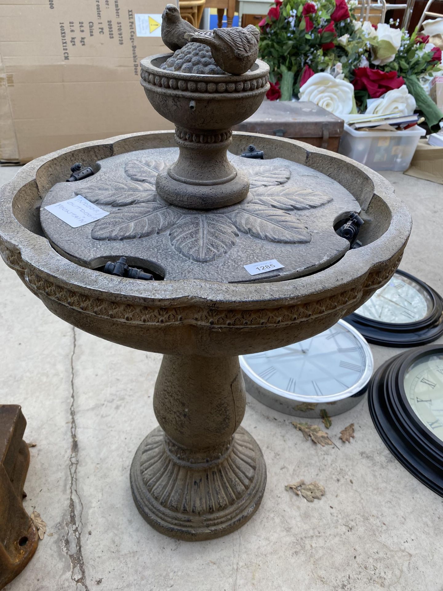 A PLASTIC INDOOR OR OUTDOOR WATER FOUNTAIN WITH SMALL BIRD DECORATION