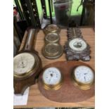 FOUR WOODEN FRAMED BAROMETERS TO INCLUDE A CLOCK AND BAROMETER ON A WOODEN PLINTH