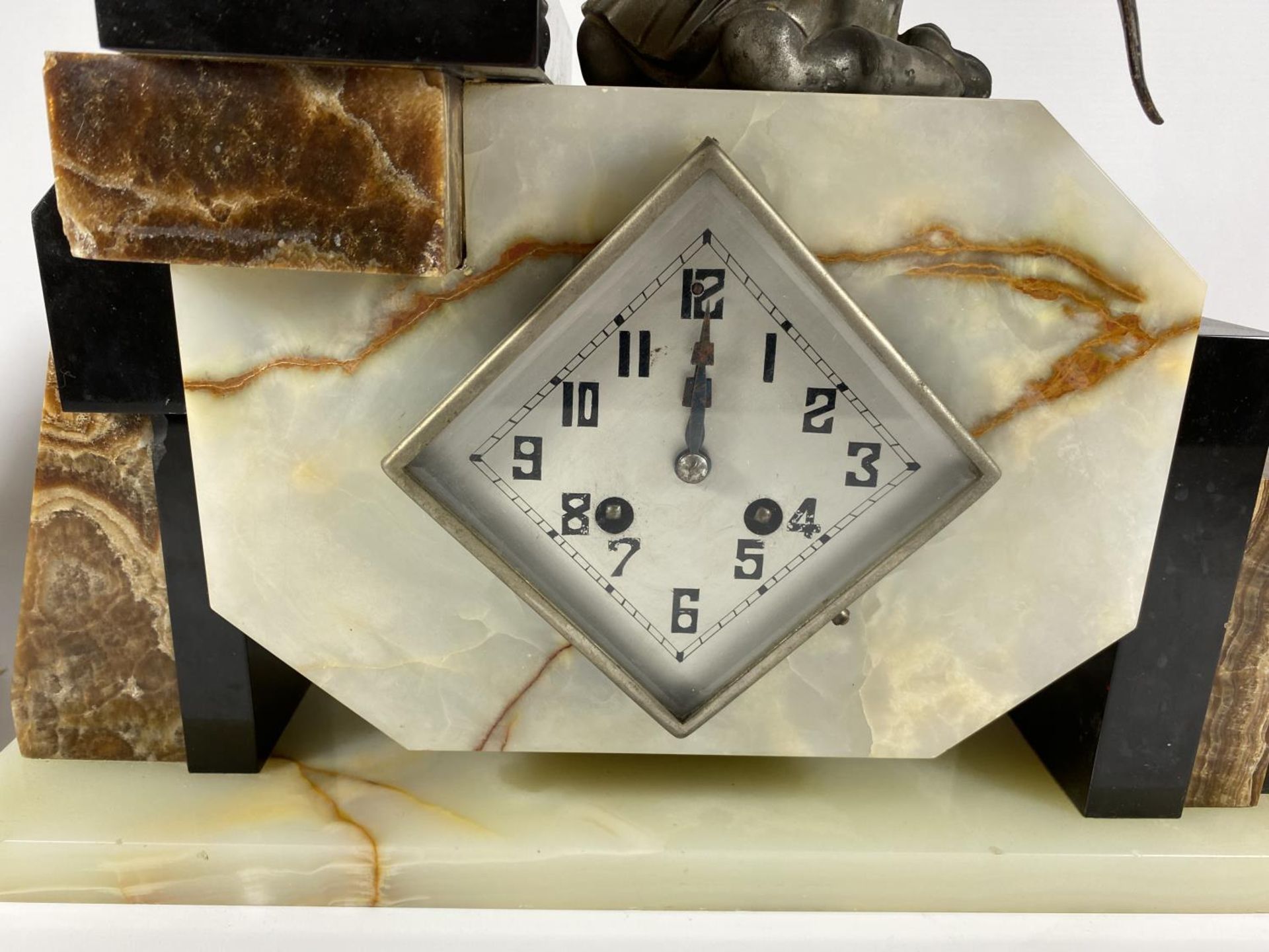 AN ART DECO MANTLE CLOCK WITH GIRL WITH BIRD FINIAL DESIGN AND SIDE GARNITURES - Image 3 of 3