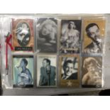 A QUANTITY OF FULL SETS OF CIGARETTE CARDS TO INCLUDE FILM STARS, TRAINS, MOTOR RACING, WORLD OF