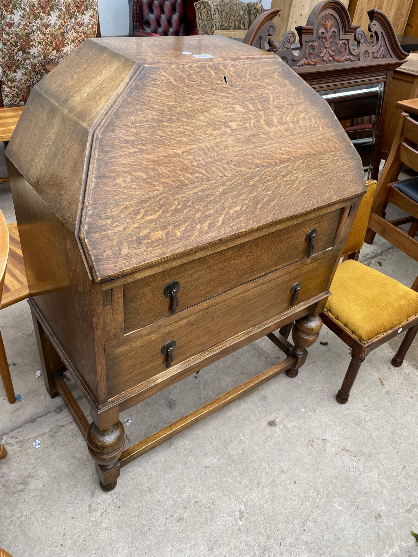 AN EARLY 20TH CENTURY OAK BUREAU WITH SARCOPHAGUS SHAPED TOP AND TWO DRAWERS, ON OPEN BASE, 29" WIDE - Image 3 of 7