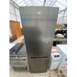 A SILVER KENWOOD UPRIGHT FRIDGE FREEZER