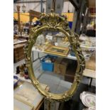 A VINTAGE GILT FRAME WALL MIRROR