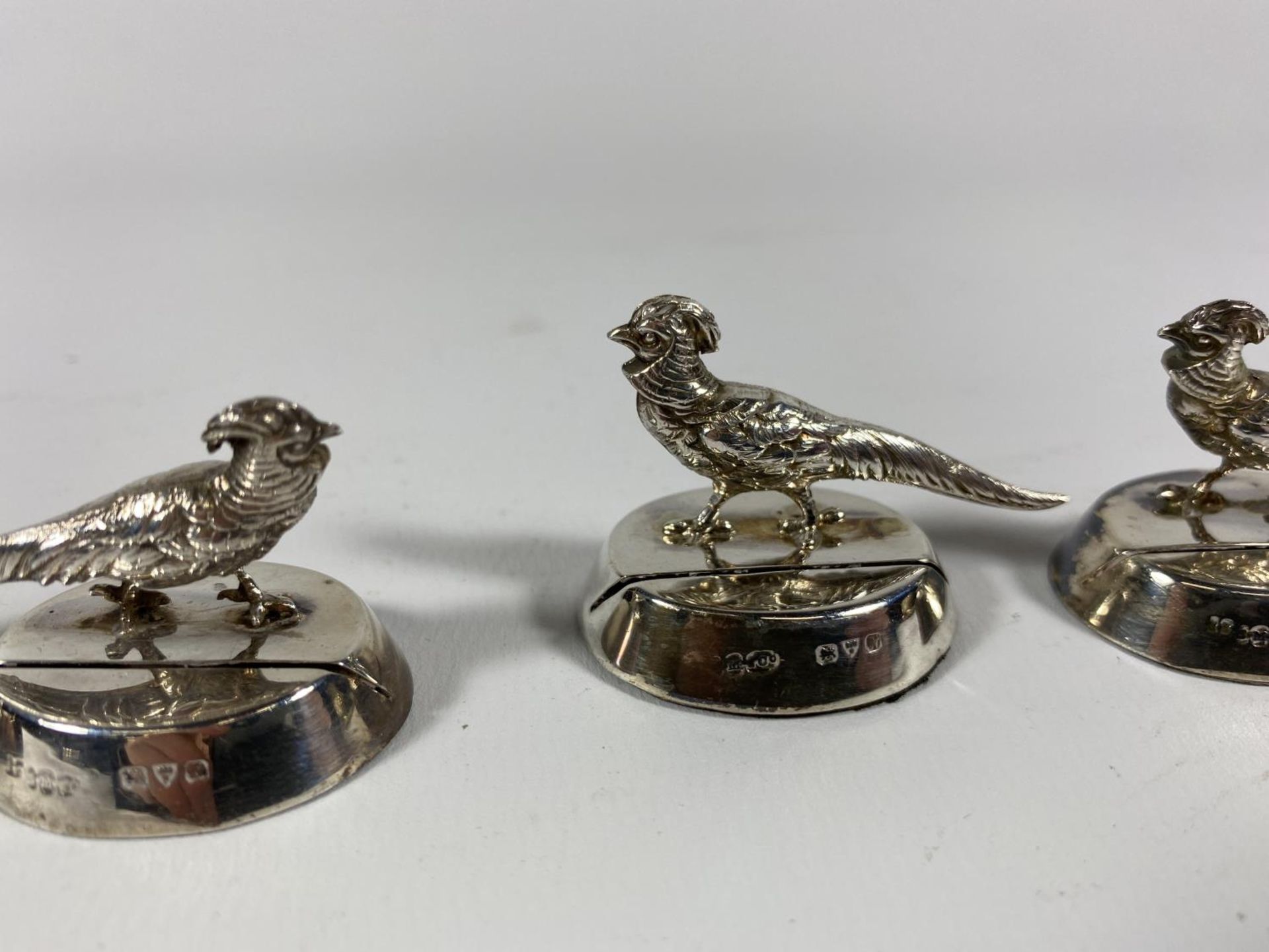 A SET OF FOUR GEORGE V HALLMARKED SILVER PHEASANT PLACEHOLDERS, DATES TO CHESTER, 1913 - Image 4 of 6