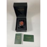 A BOXED 'GAMAGES' OF LONDON WATCH WITH GUARENTEE CARD
