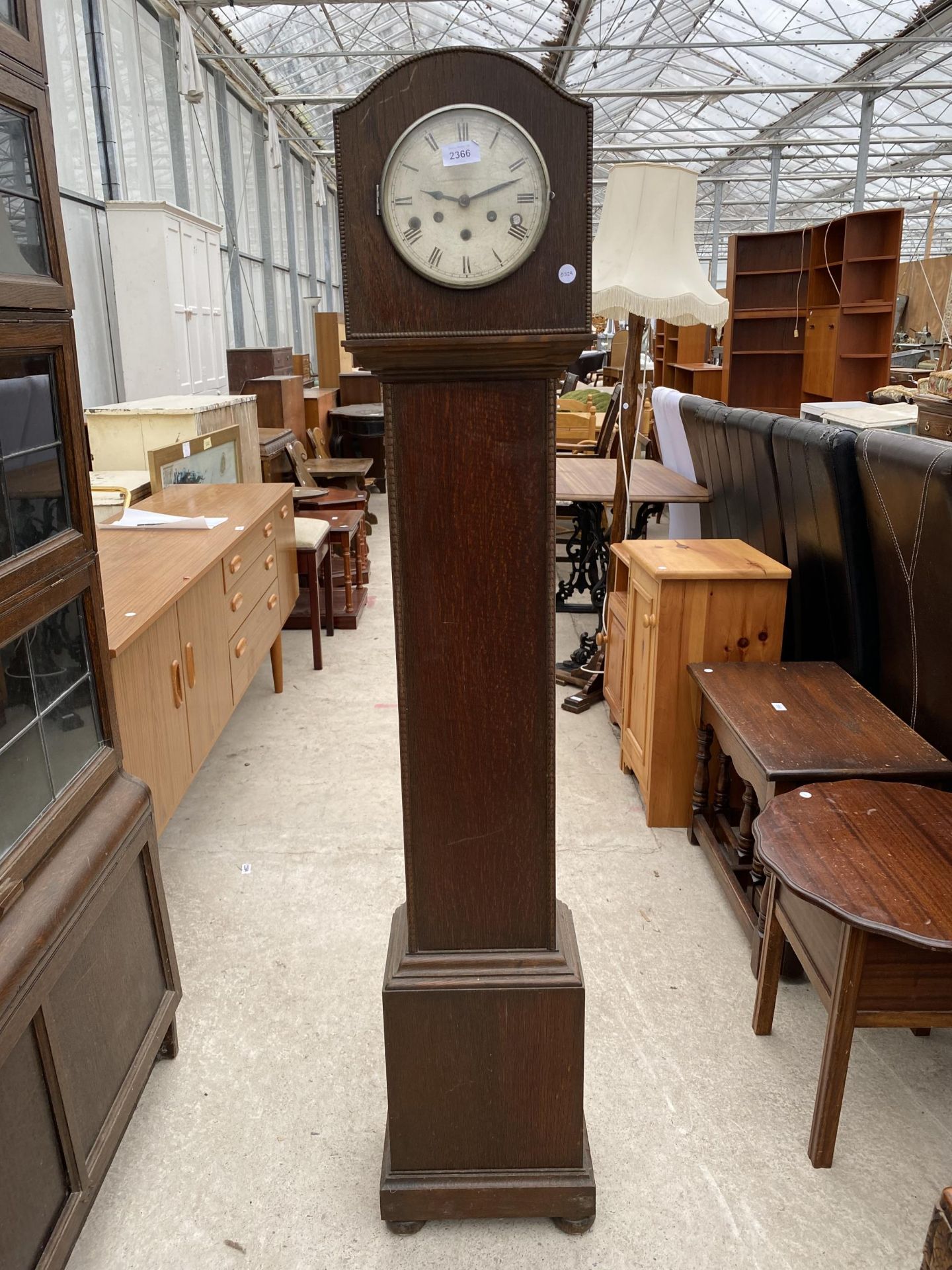 A MID 20TH CENTURY OAK GRANDMOTHER CLOCK