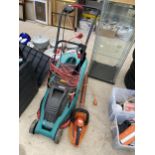 A BOSCH ROTAK 36 ELECTRIC LAWN MOWER AND A BLACK AND DECKER ELECTRIC HEDGE TRIMMER