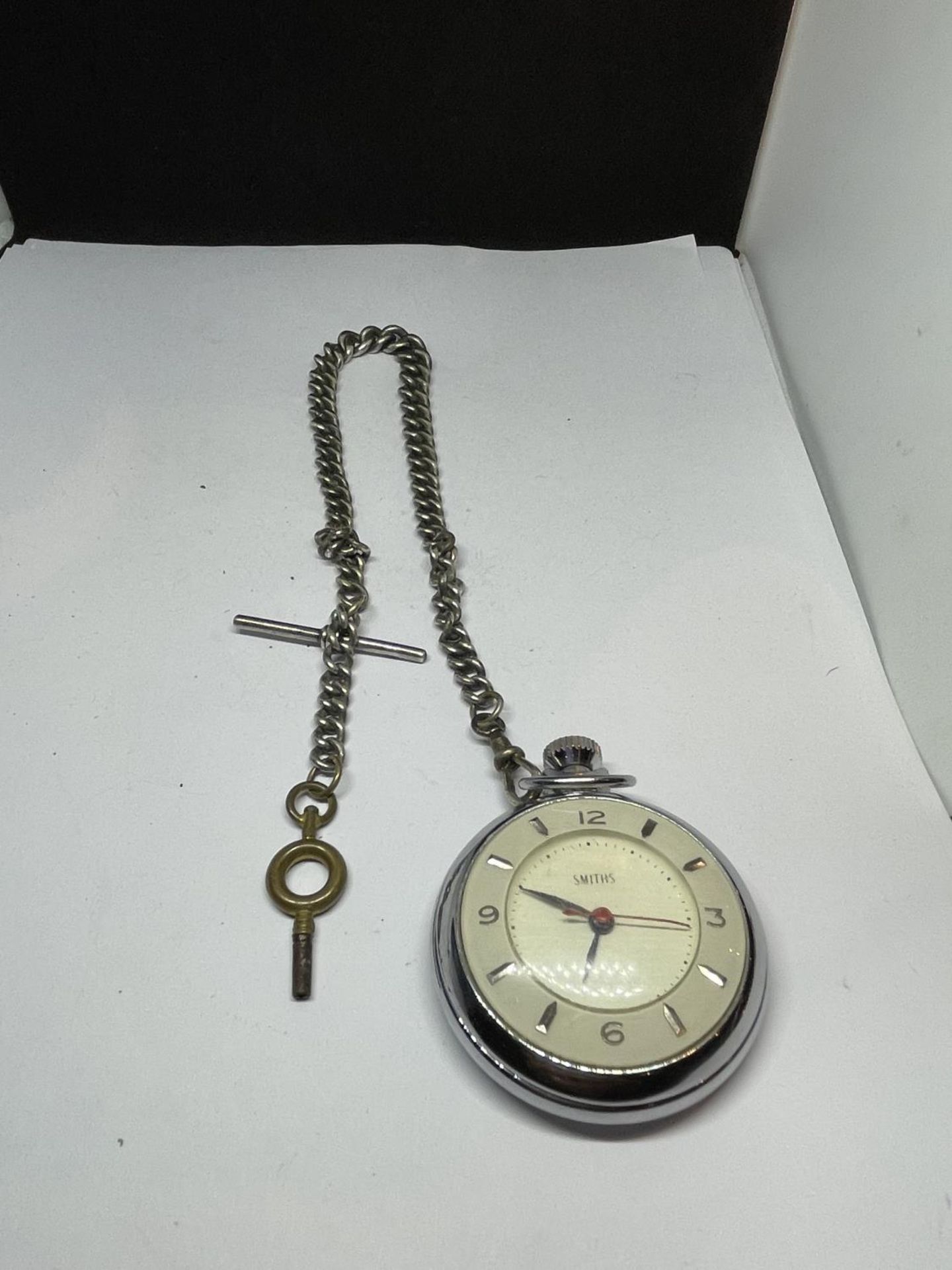 A SMITHS POCKET WATCH AND CHAIN