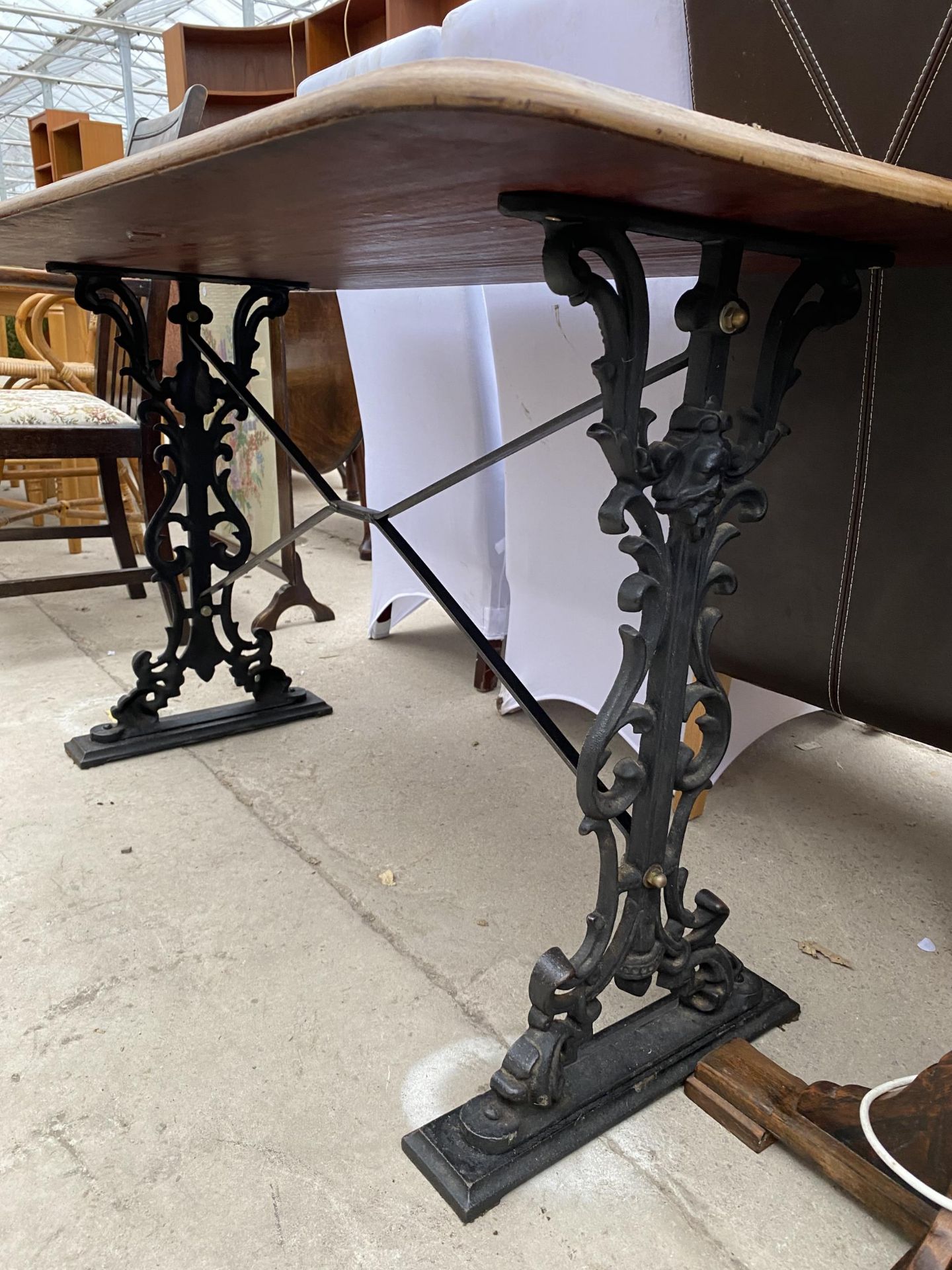 A PUB TABLE ON CAST IRON BASE, 48X27" - Image 3 of 3