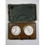 A LEATHER CASED J.C VICKERY 8 DAY TRAVEL CLOCK & BAROMETER SET, CASE A/F