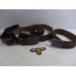 FOUR LEATHER BELTS, TWO WITH NAZI GERMANY BUCKLES, NAZI BADGE