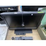 A SONY 26" TELEVISION WITH REMOTE CONTROL