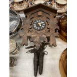 A GERMAN BLACK FOREST STYLE CUCKOO CLOCK