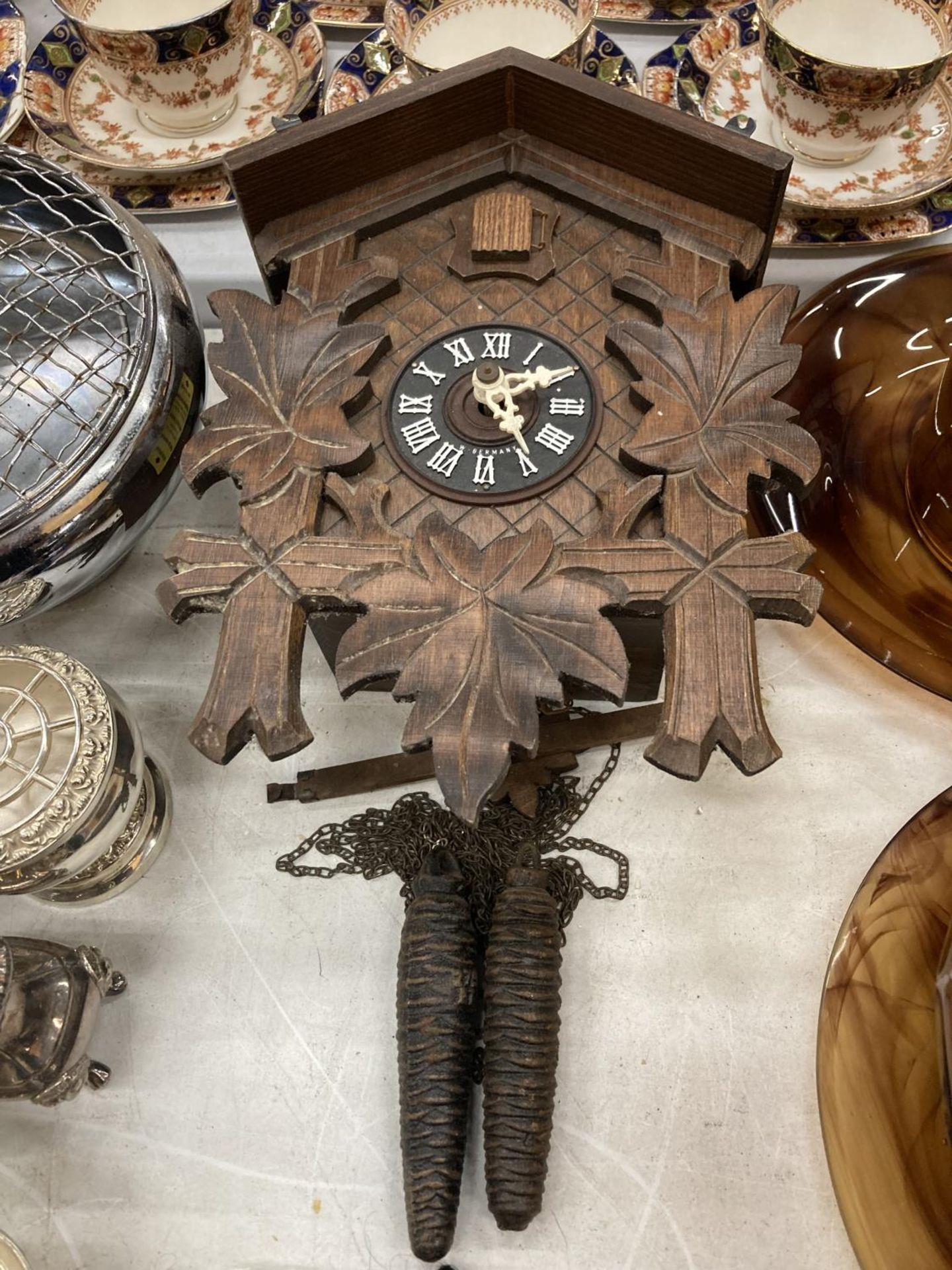 A GERMAN BLACK FOREST STYLE CUCKOO CLOCK