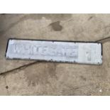 A VINTAGE METAL 'WHITEGATE' ROAD SIGN