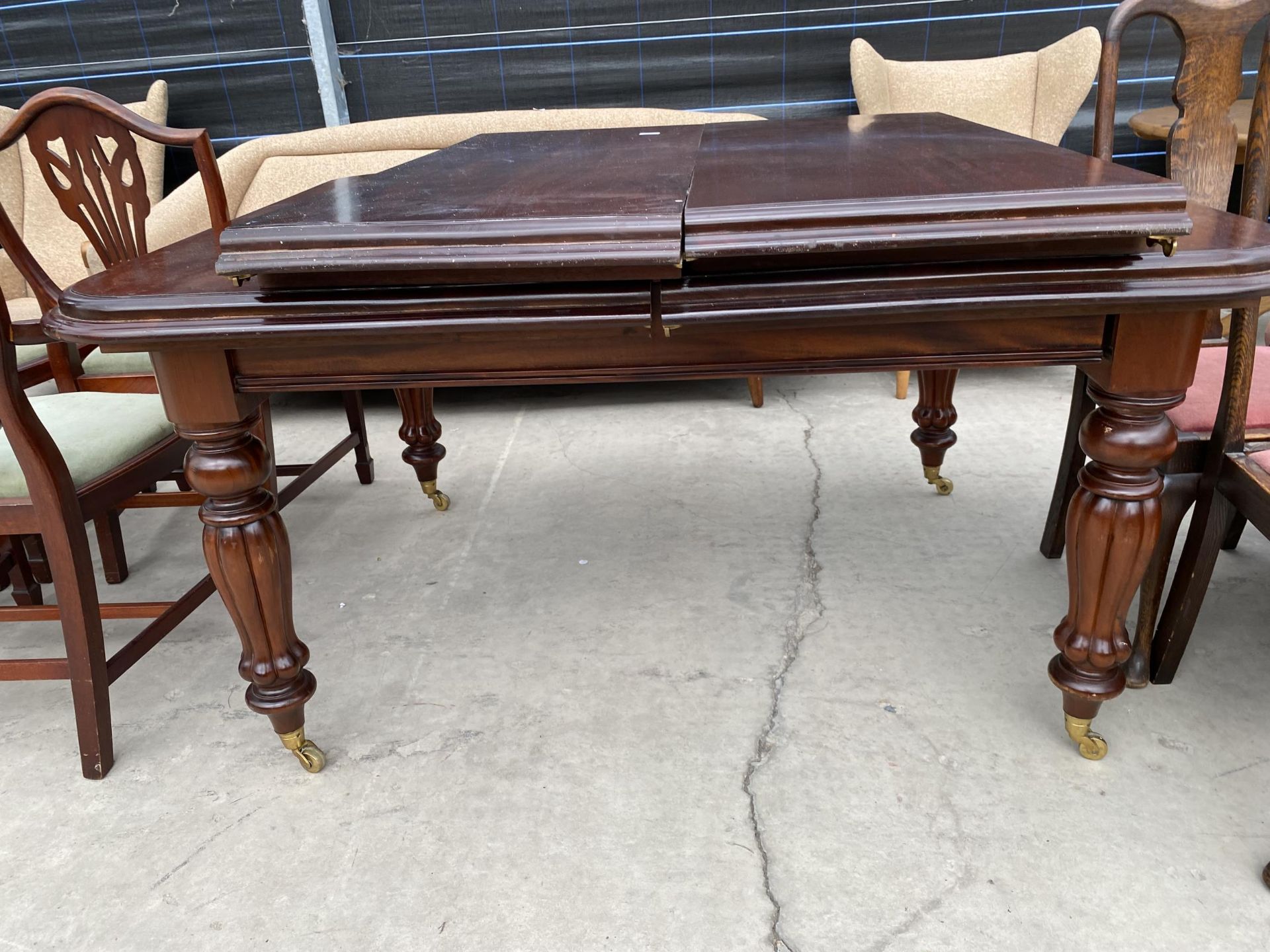 A VICTORIAN STYLE MAHOGANY PULL-OUT DINING TABLE, 59X48" (TWO LEAVES 19" EACH) - Image 2 of 3