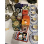 A COLLECTION OF VINTAGE TINS TO INCLUDE CHURCHILLS TELEPHONE BOX MONEY BOXES, CADBURY'S VAN,