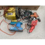 AN ASSORTMENT OF POWER TOOLS TO INCLUDE A TRANSFORMER, A BELT SANDER AND A BOSCH JIGSAW ETC