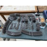 A LARGE QUANTITY OF OO GAUGE TRAIN TRACK AND ACCESSORIES