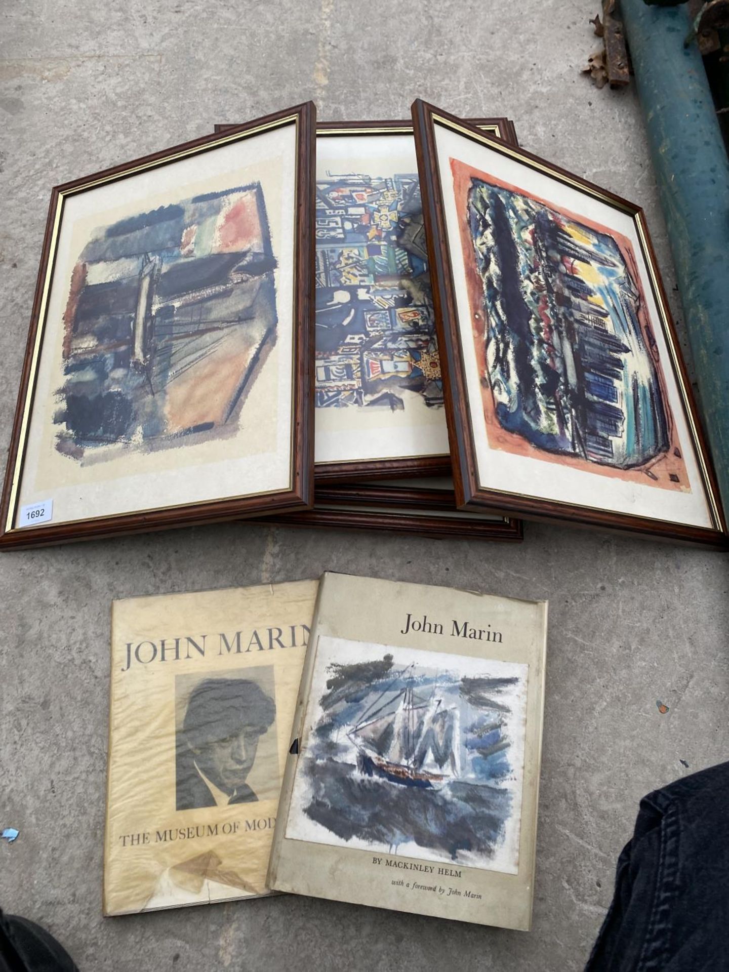 AN ASSORTMENT OF FRAMED PRINTS AND TWO HARDBACK BOOKS