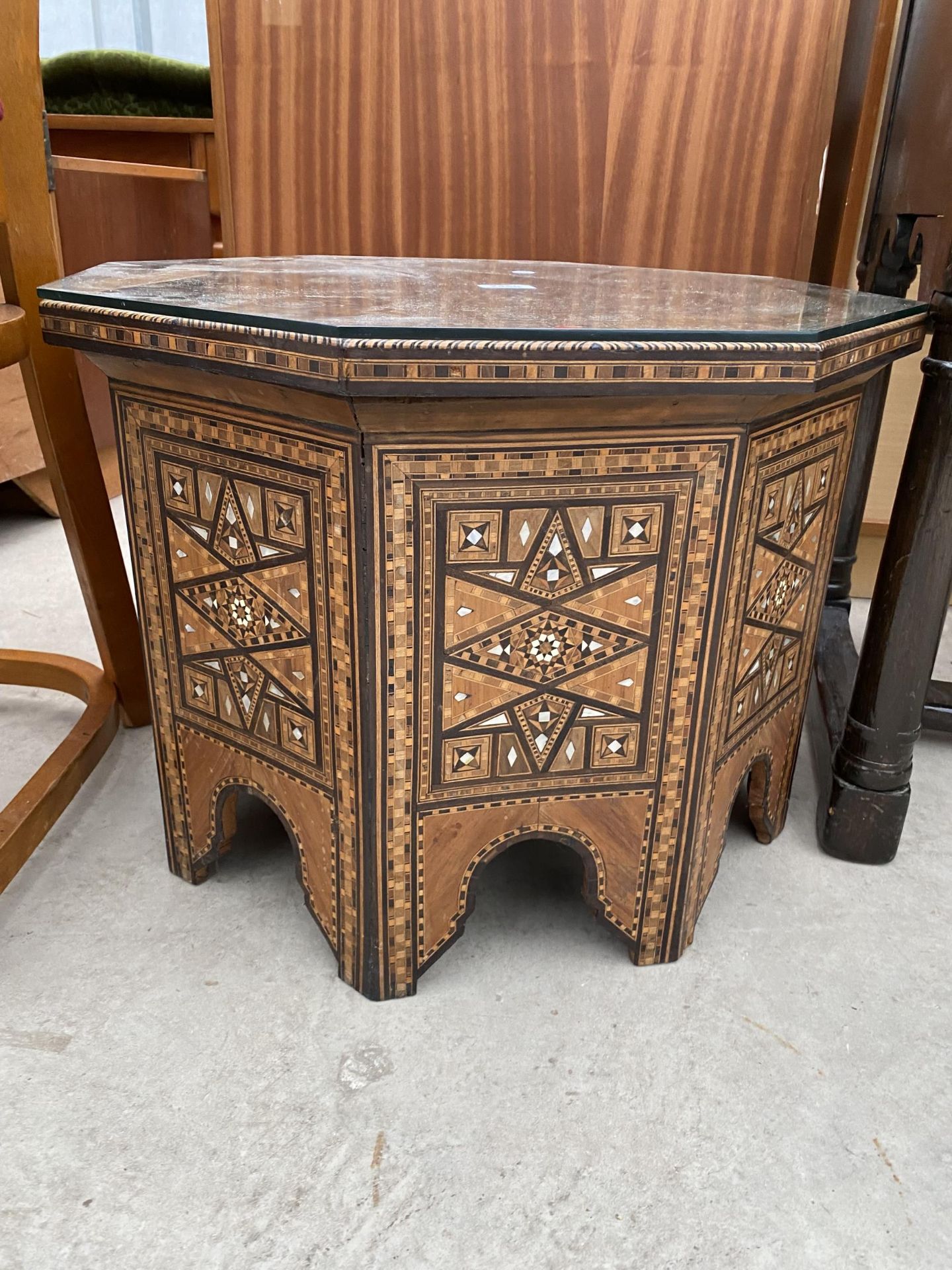 AN OCTAGONAL SYRIAN COFFEE TABLE PROFUSELY INLAID WITH MOTHER OF PEARL BEARING LABEL 'ABOUANI - Image 2 of 3