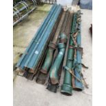 A LARGE QUANTITY OF VINTAGE CAST IRON GUTTERS, DOWN SPOUTS AND BRACKETS ETC