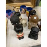 A COLLECTION OF VINTAGE MONEY BOXES TO INCLUDE SOLDIERS, ETC PLUS DISNEY MUGS