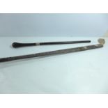 A LATE 19TH CENTURY HARDWOOD CLUB/SWAGGER STICK, 55CM LENGTH, WITH SILVER COLLAR, AFRICAN FISHING