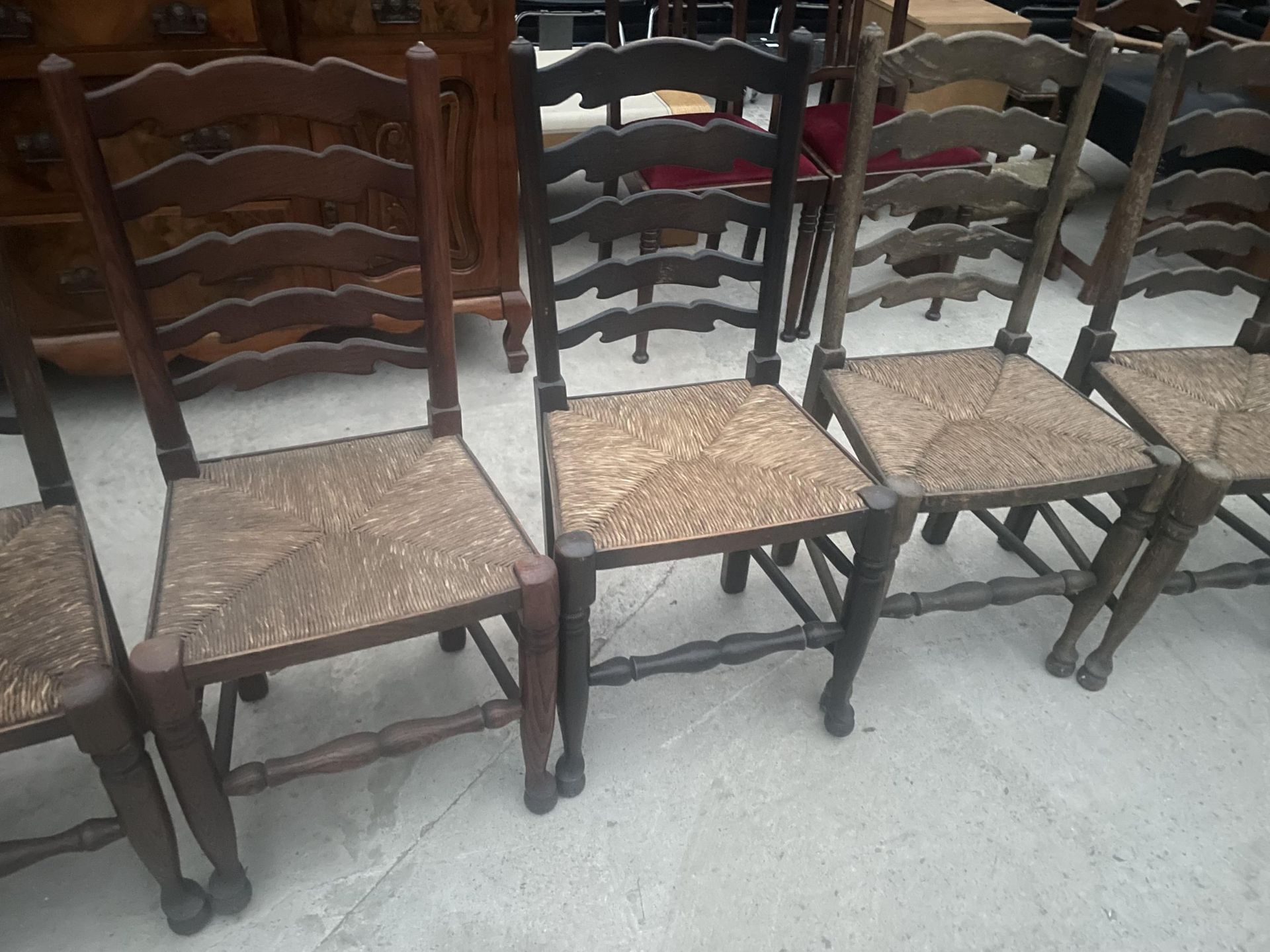 A SET OF EIGHT LANCASHIRE STYLE LADDERBACK DINING CHAIRS WITH RUSH SEATS - Image 4 of 7