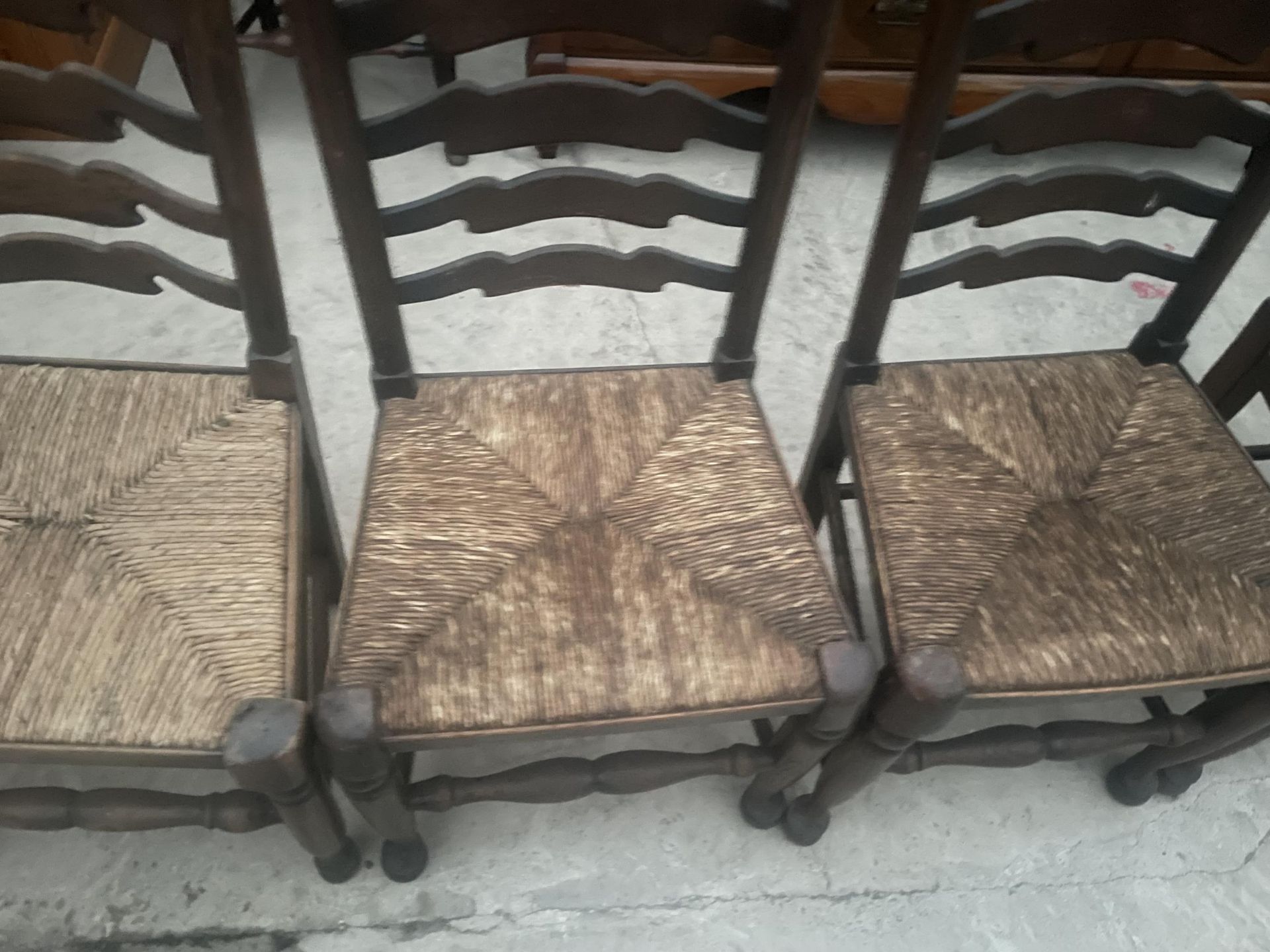 A SET OF EIGHT LANCASHIRE STYLE LADDERBACK DINING CHAIRS WITH RUSH SEATS - Image 3 of 7