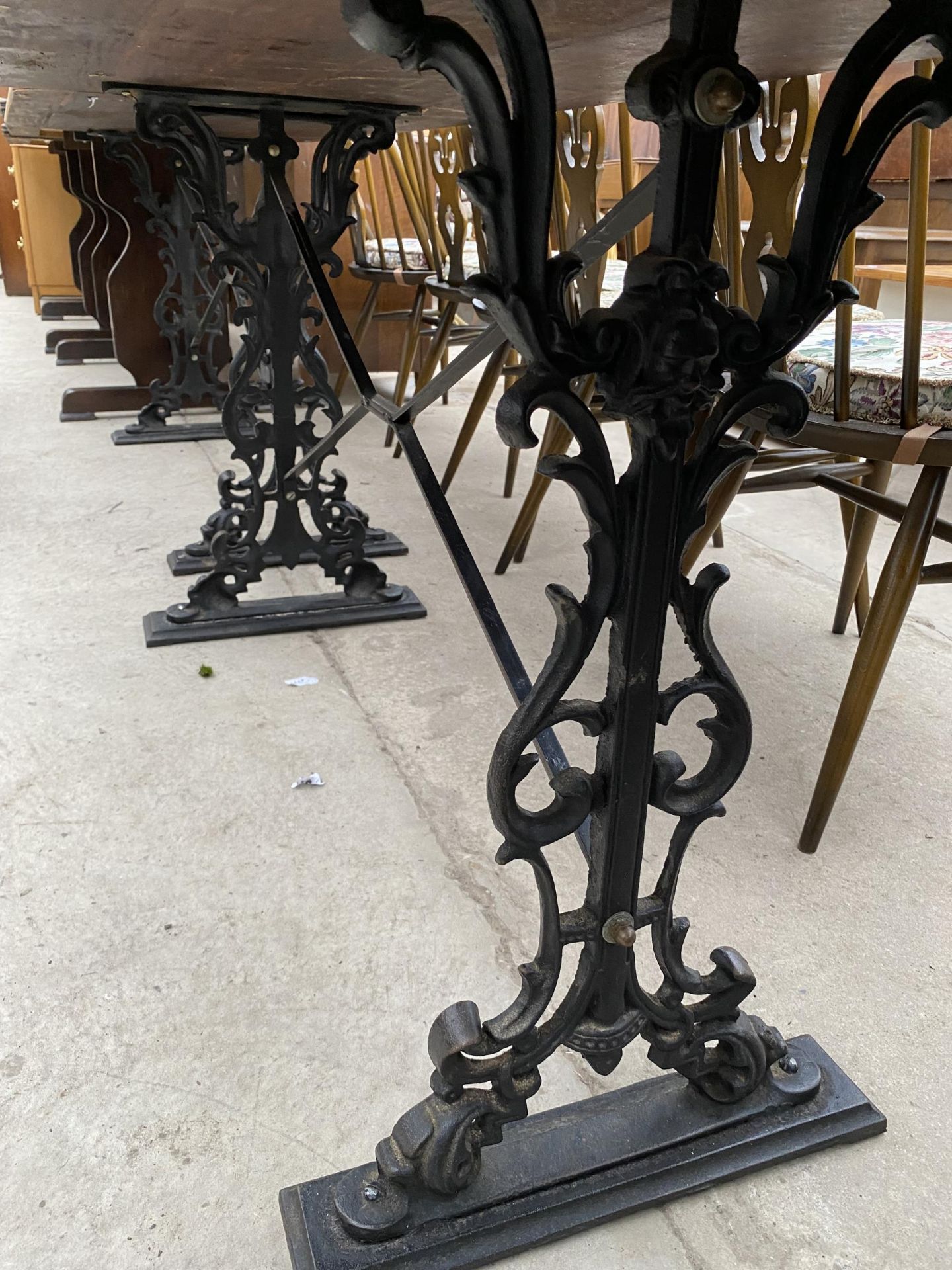 A PUB TABLE ON CAST IRON BASE, 48X27" - Image 3 of 4