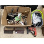 AN ASSORTMENT OF TOOLS TO INCLUDE SHARPENING STONES, PAINT BRUSHES AND A BLACK AND DECKER DRILL ETC