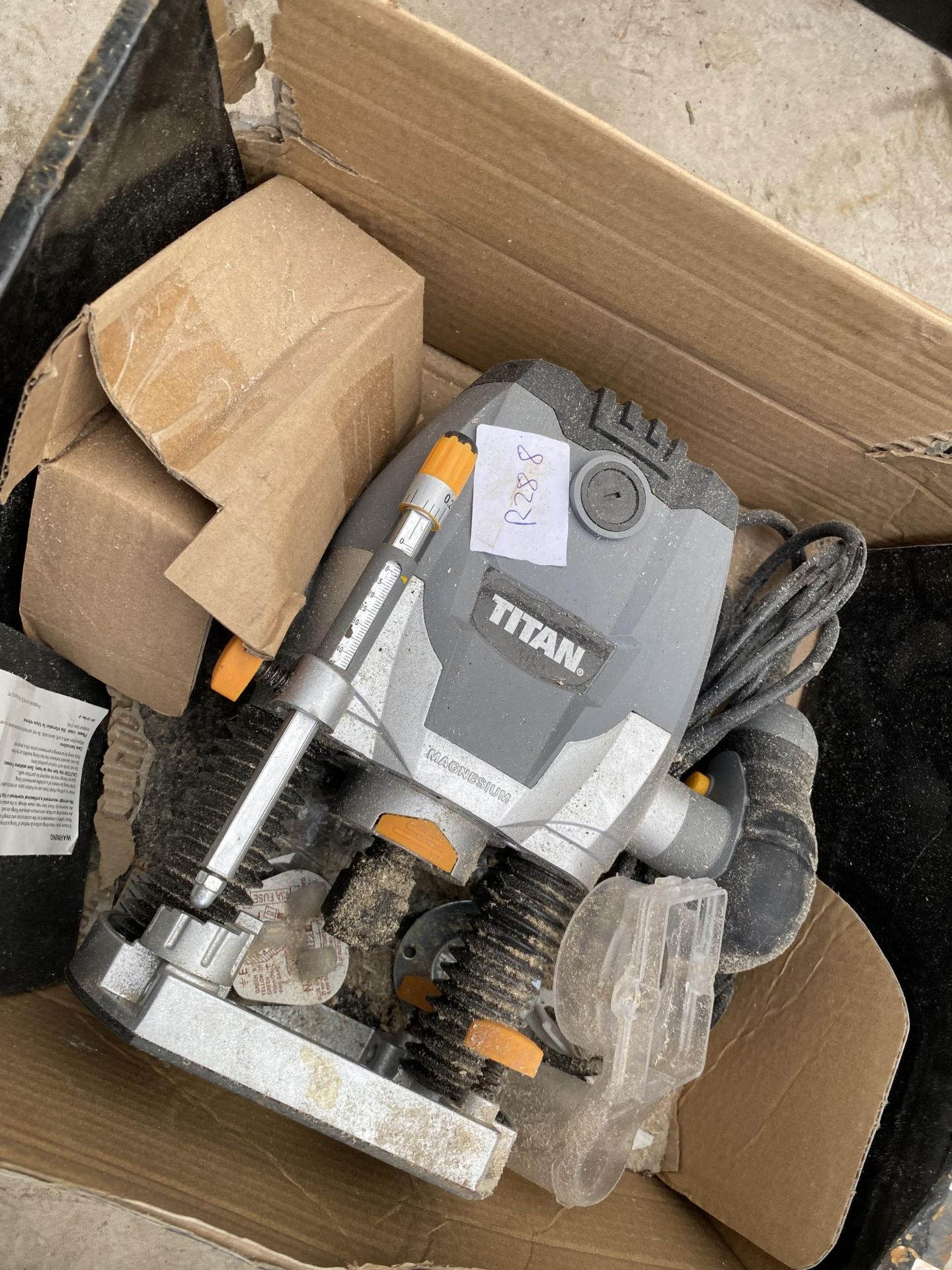 A TITAN ELECTRIC ROUTER AND AN HITAHCI 110V ANGLE GRINDER - Image 2 of 2