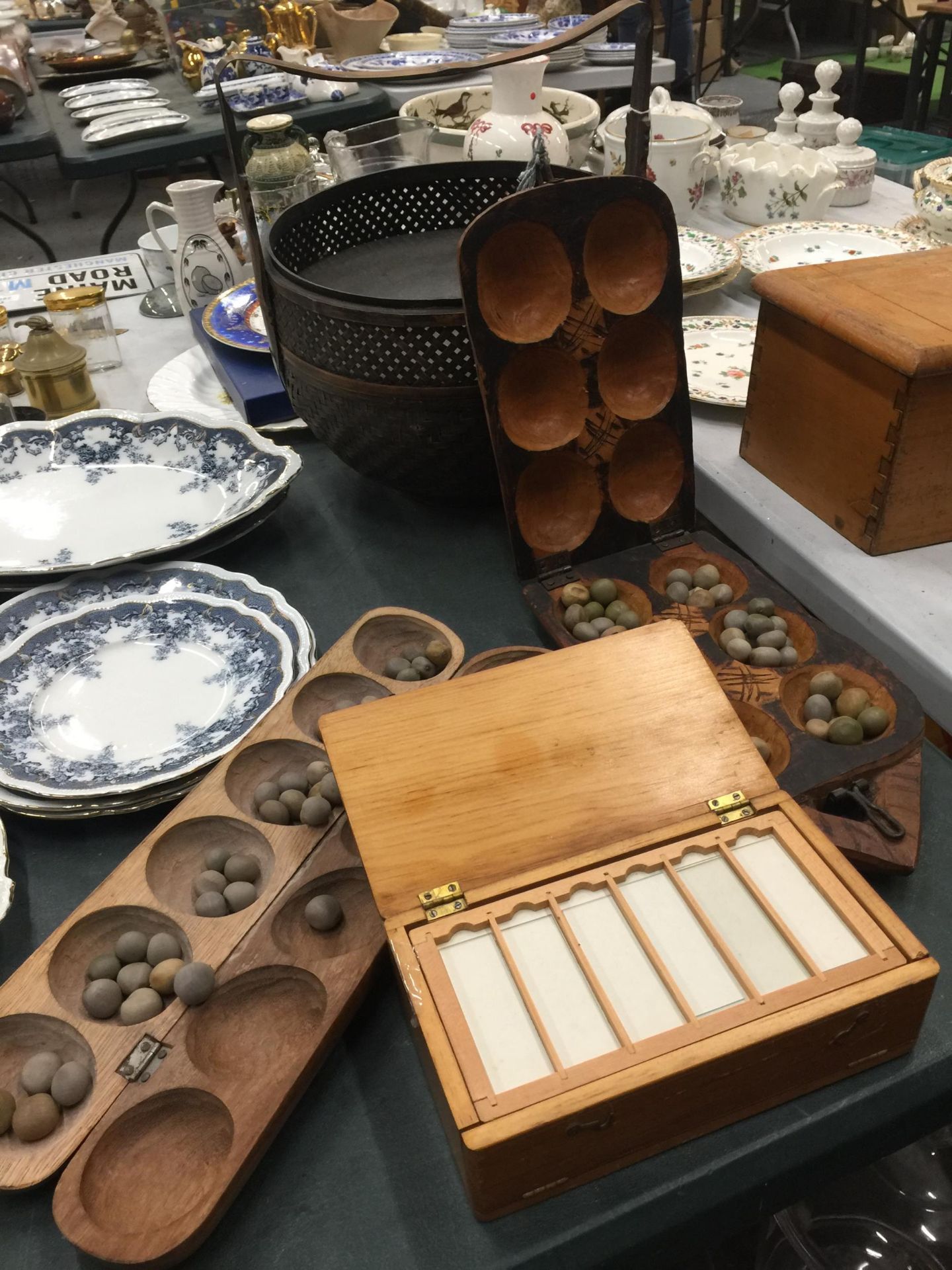 TWO VINTAGE AFRICAN MANCALA GAMES, A PINE BOX CONTAINING LABORATORY SLIDES AND AN ORIENTAL WEDDING