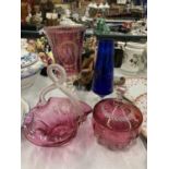 THREE PIECES OF CRANBERRY GLASS TO INCLUDE A FOOTED VASE WITH EMBOSSED BIRD DECORATION, A BASKET