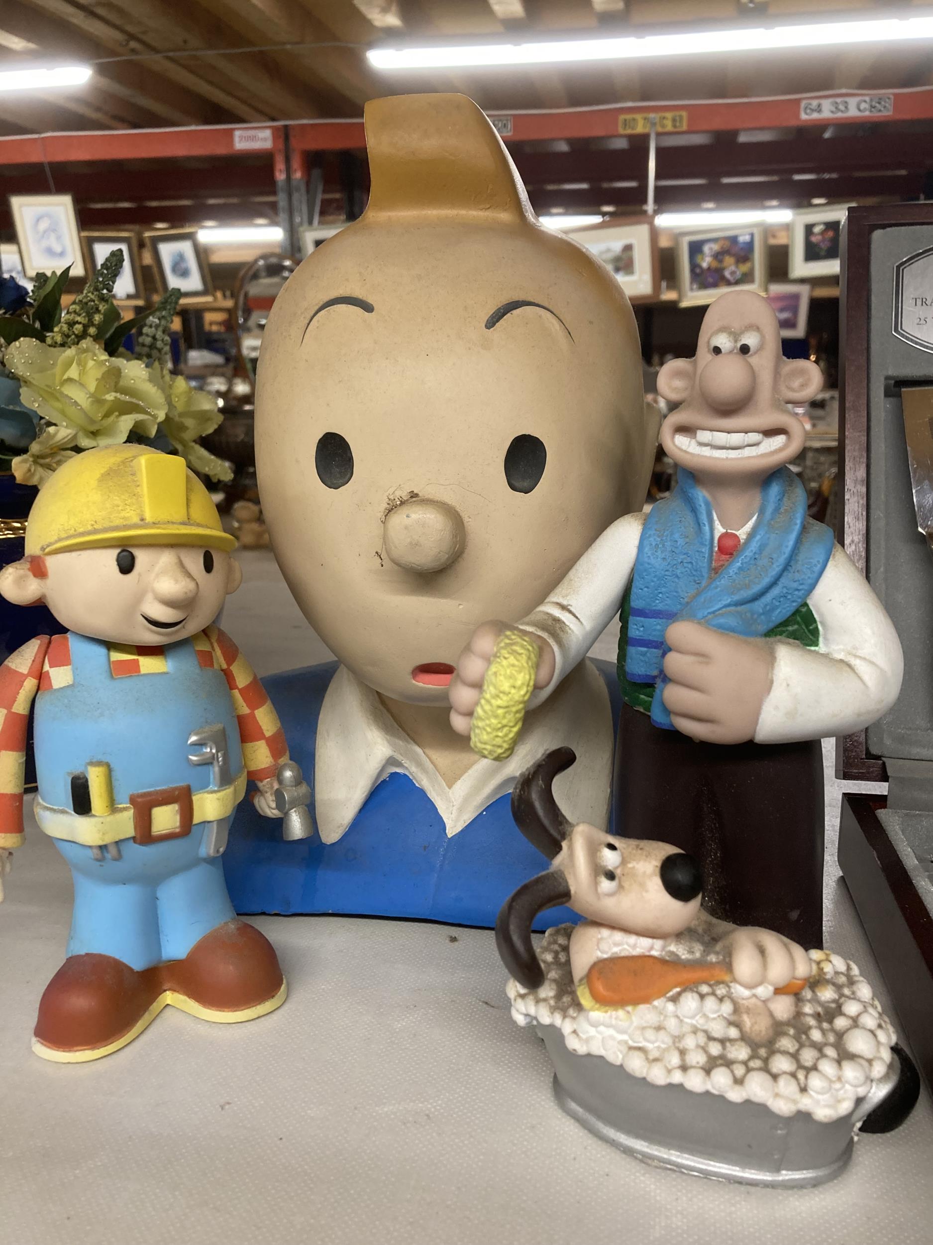 THREE CHILDREN'S CHARACTER FIGURES TO INCLUDE TINTIN, BOB THE BUILDER AND WALLACE AND GROMIT