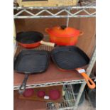AN ASSORTMENT OF CAST IRON COOKING POTS AND PANS TO INCLUDE A LE CREUSET CASAROLE DISH ETC