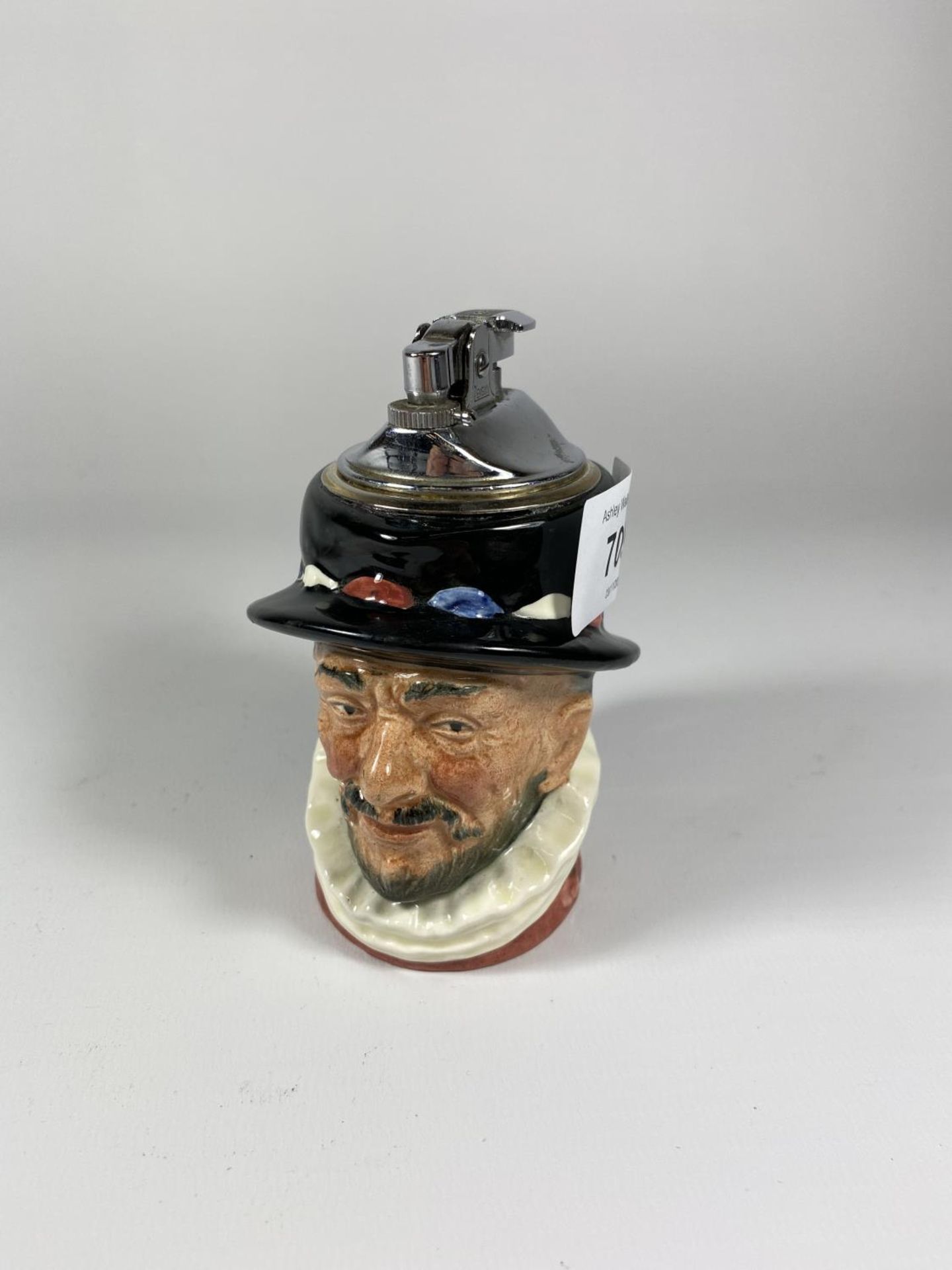 A ROYAL DOULTON BEEFEATER TABLE LIGHTER