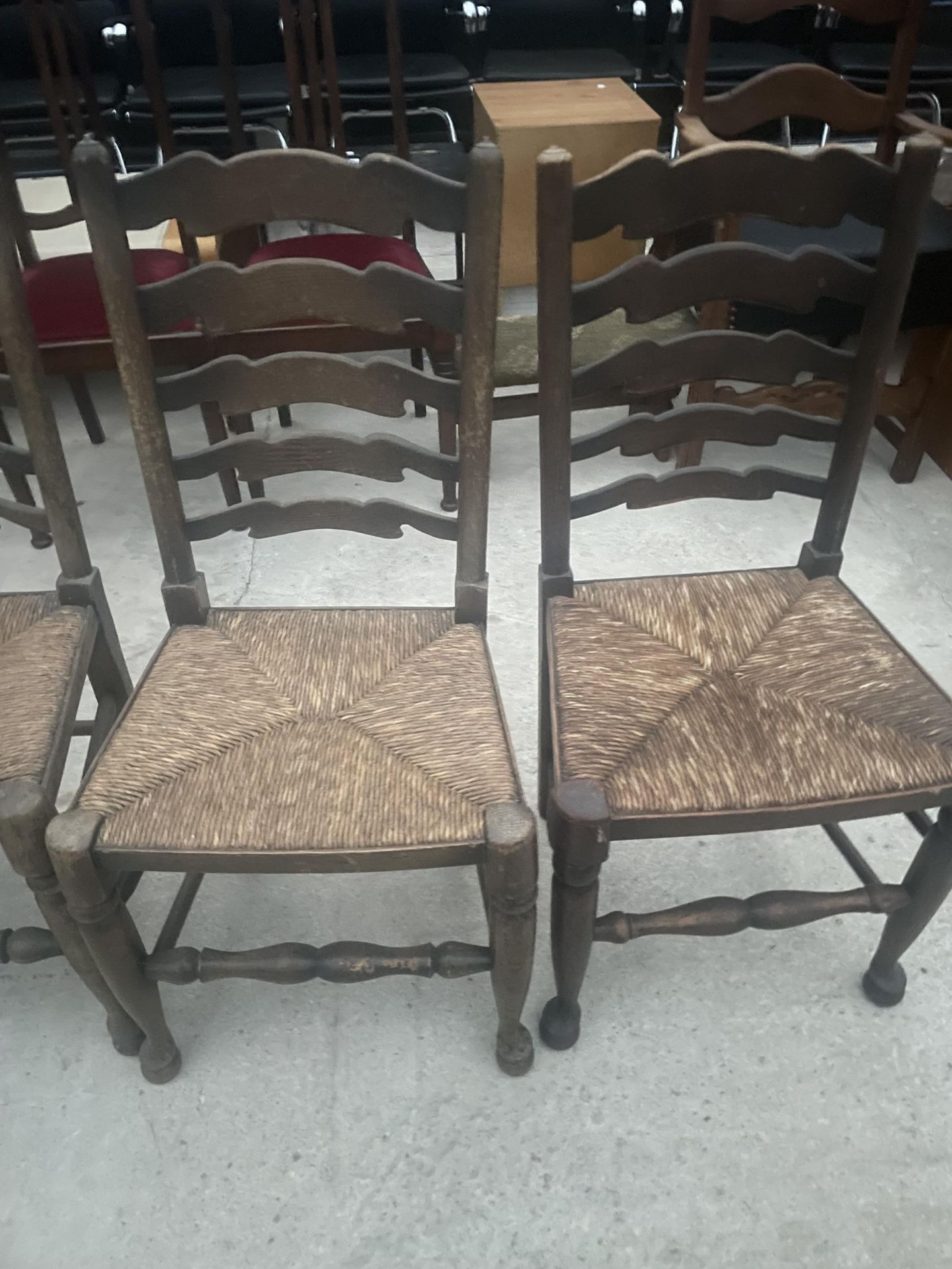 A SET OF EIGHT LANCASHIRE STYLE LADDERBACK DINING CHAIRS WITH RUSH SEATS - Image 6 of 7