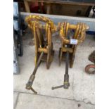 A PAIR OF HEAVY DUTY CLAMPING HOIST LIFTS