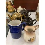 FOUR VINTAGE TEAPOTS TO INCLUDE A ROYAL WORCESTER GOLD COLOURED PLUS TWO VINTAGE JUGS