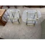 A PAIR OF MODERN GLASS TOPPED LAMP TABLES, 21" SQUARE, ON GOLD COLOURED METALWARE BASES