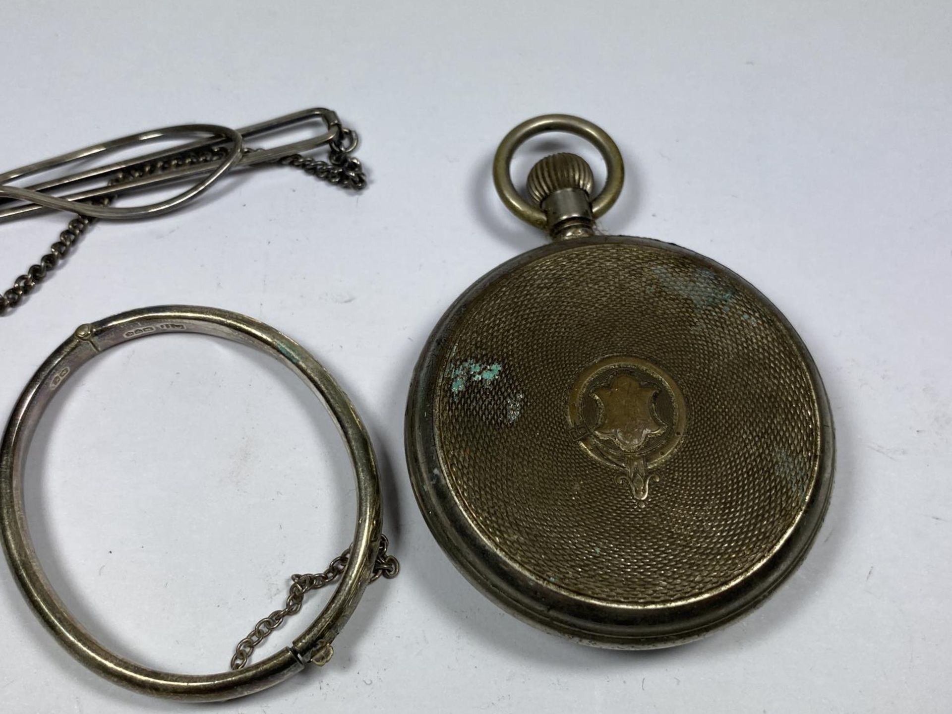 THREE ITEMS - A W.H DAWSON POCKET WATCH, HALLMARKED SILVER BANGLE AND FURTHER TIE CLIP - Image 4 of 4