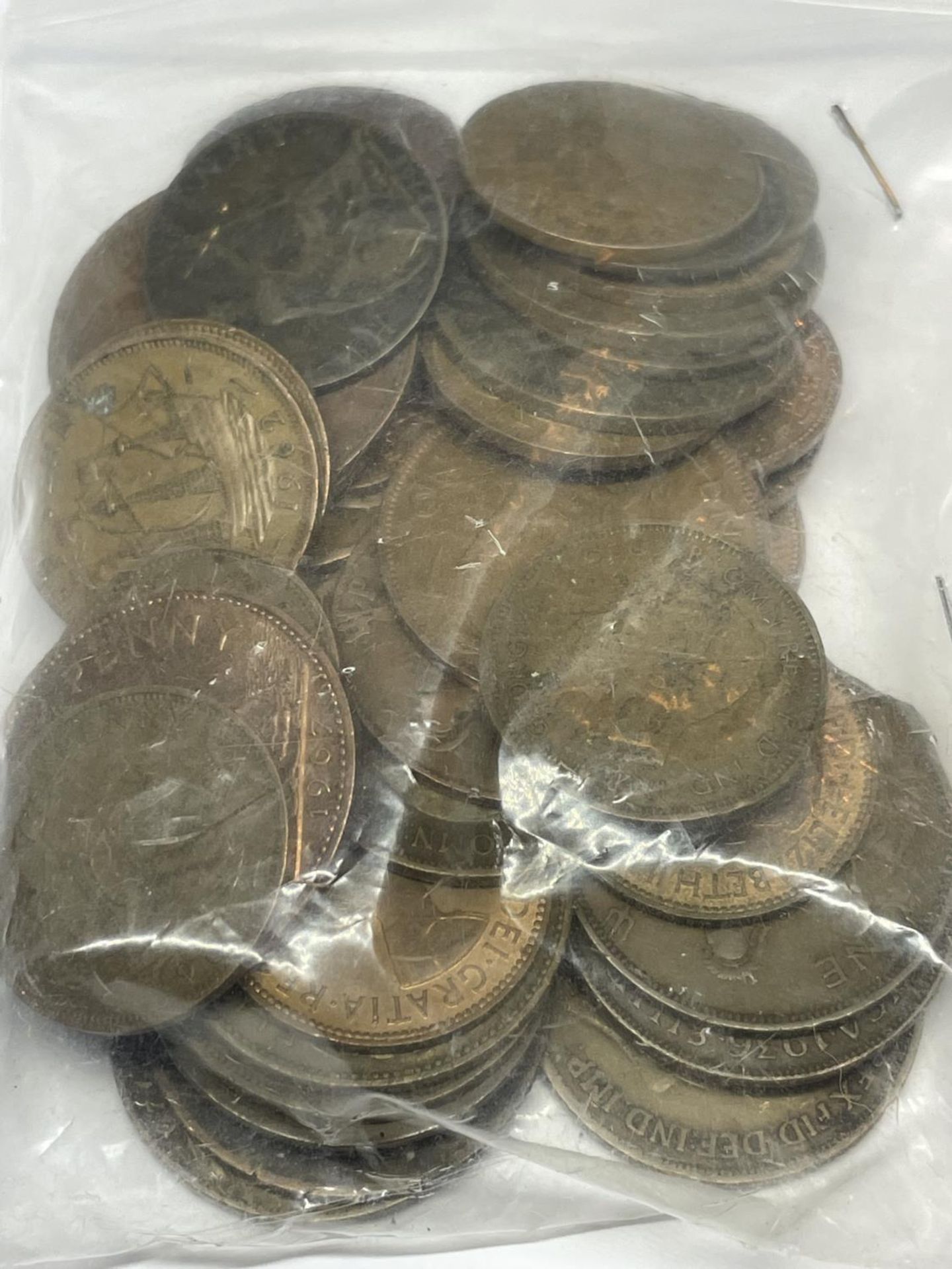 A LARGE QUANTITY OF COPPER COINS