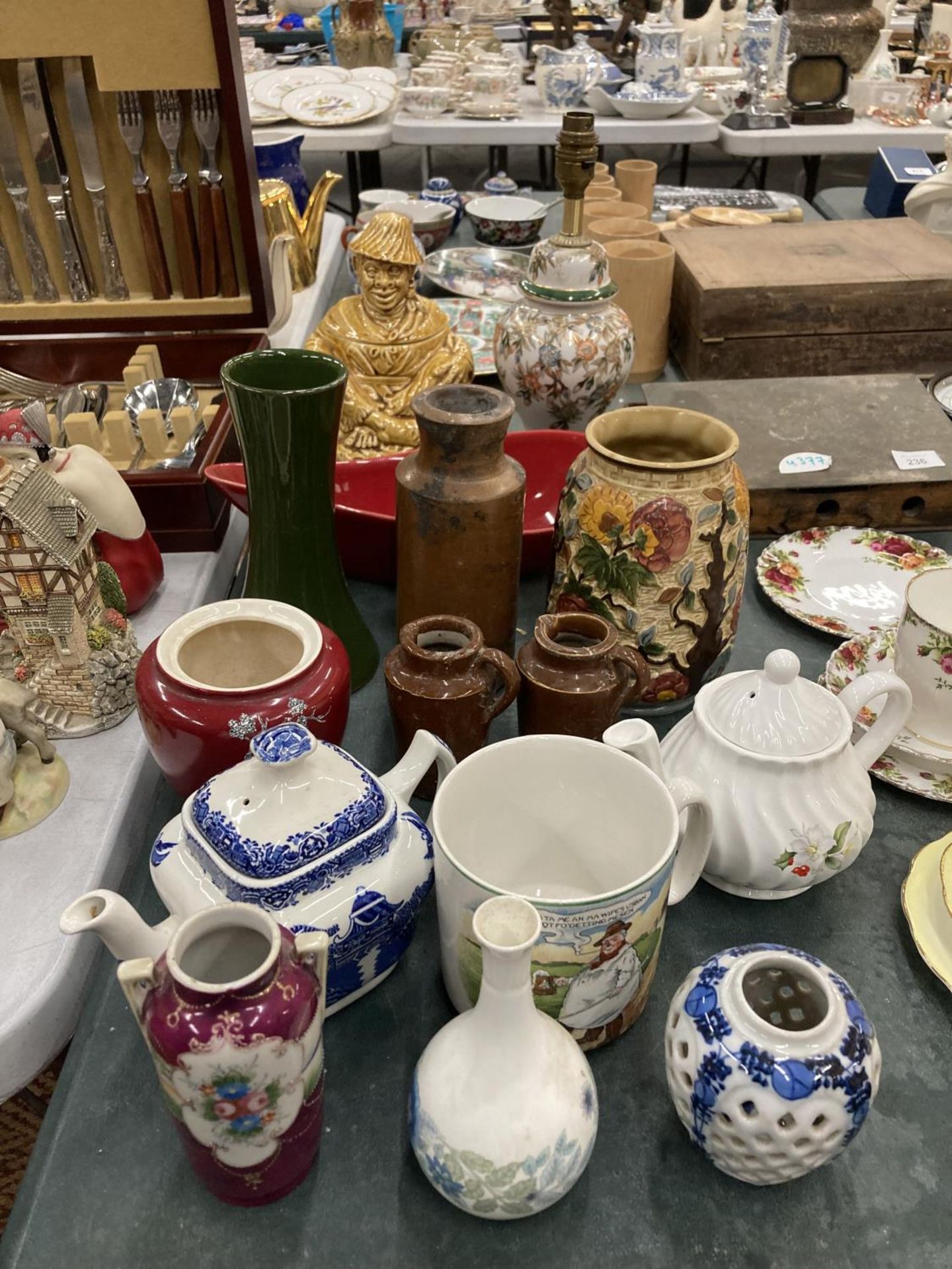 A MIXED LOT OF CERAMICS TO INCLUDE VASES, BOWLS, A SUGAR CANNISTER, TEAPOTS, STONEWARE BOTTLES, ETC