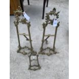 THREE DECORATIVE BRASS EASELS
